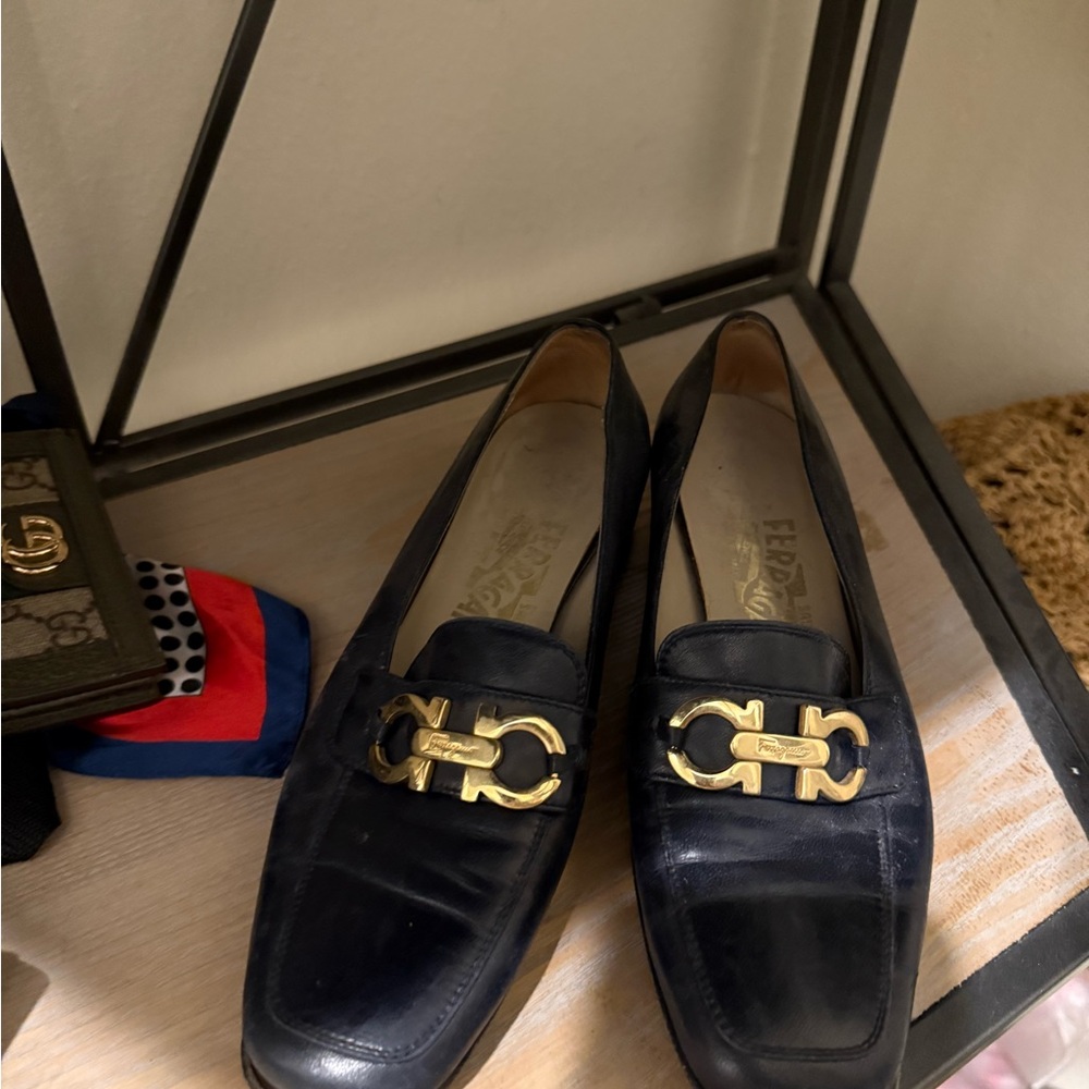 Salvatore Ferragamo Black Mules with Gold Accents